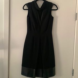 Black, mid length Christopher Kane dress. Perfect for a wedding guest!